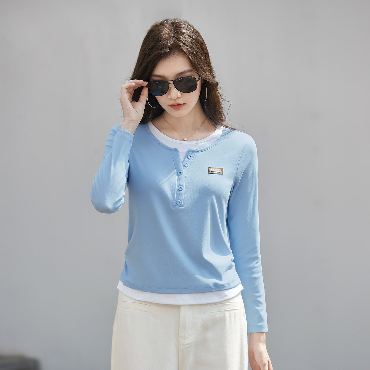 Color blocked fake two piece long sleeved T-shirt for women